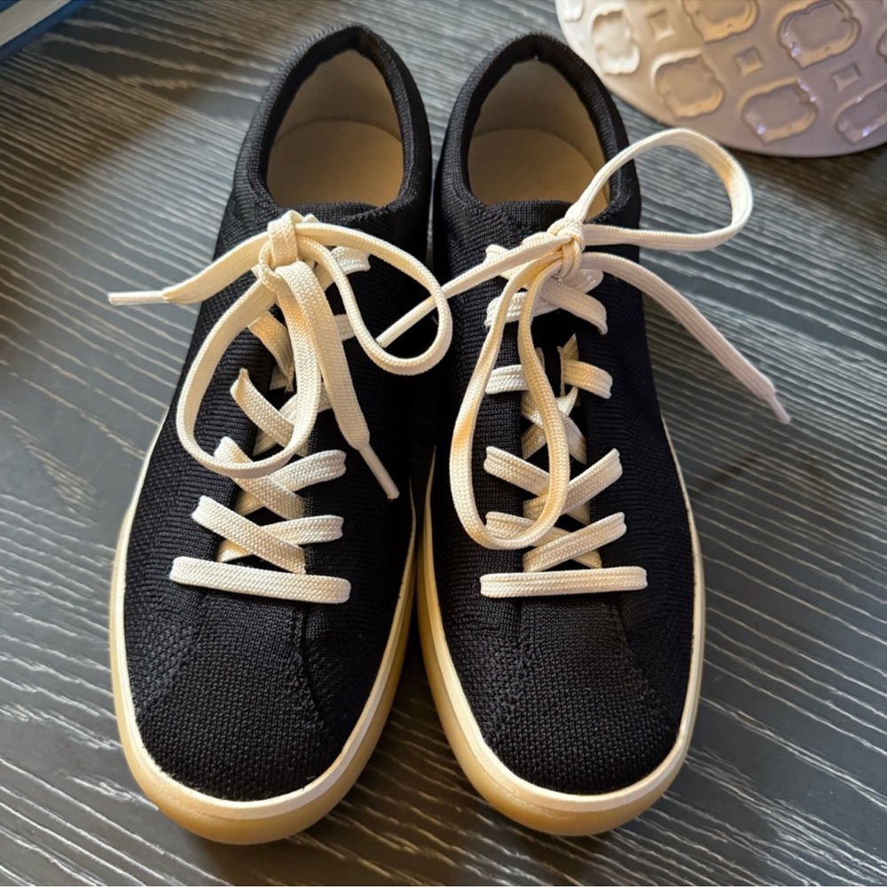 Rothy's Black and Cream Sneakers with Minimalist Design